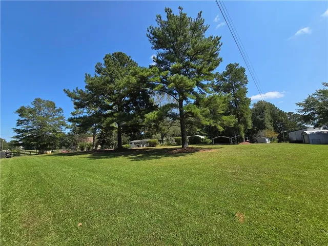 a house with trees in the background