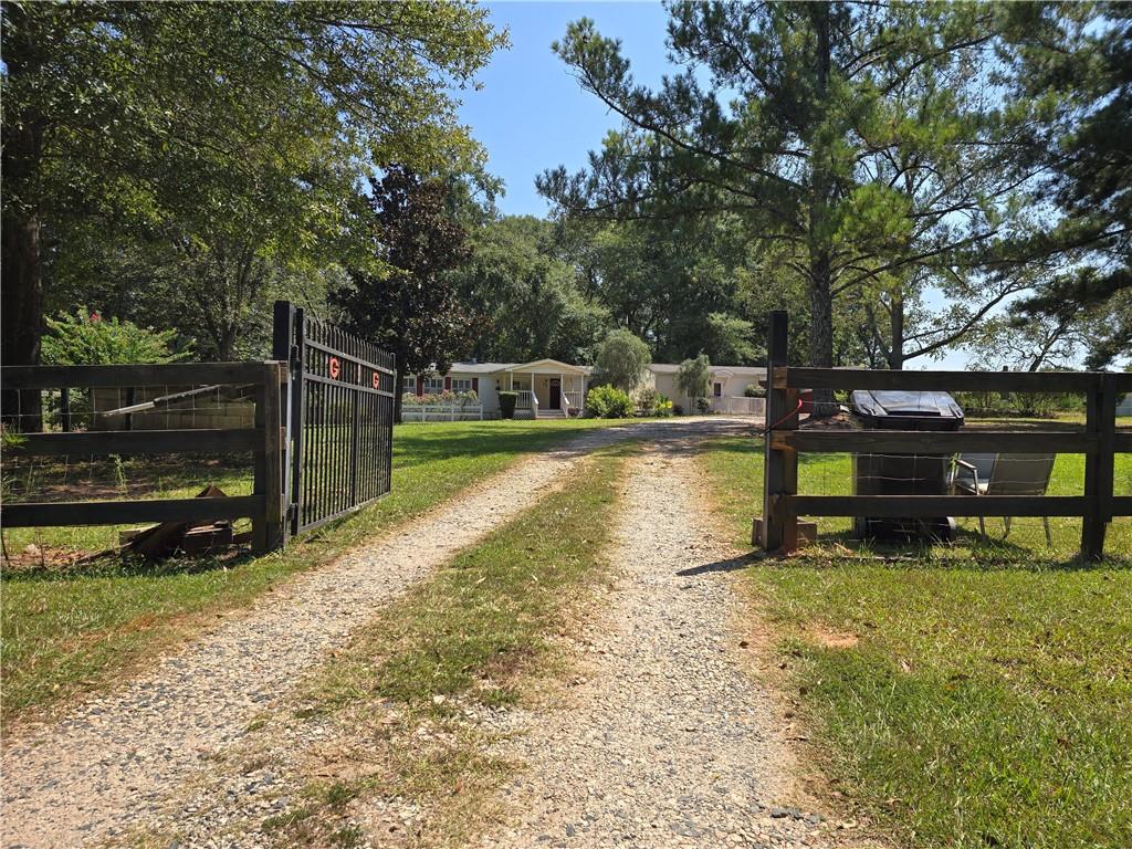 1120 Fincherville Road Jackson, GA 30233 - Photo 4 of 38 a view of a lake with houses