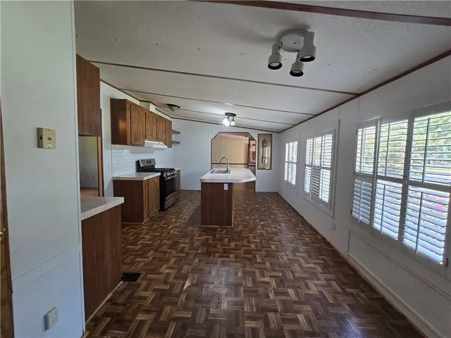 a large room with wooden floor