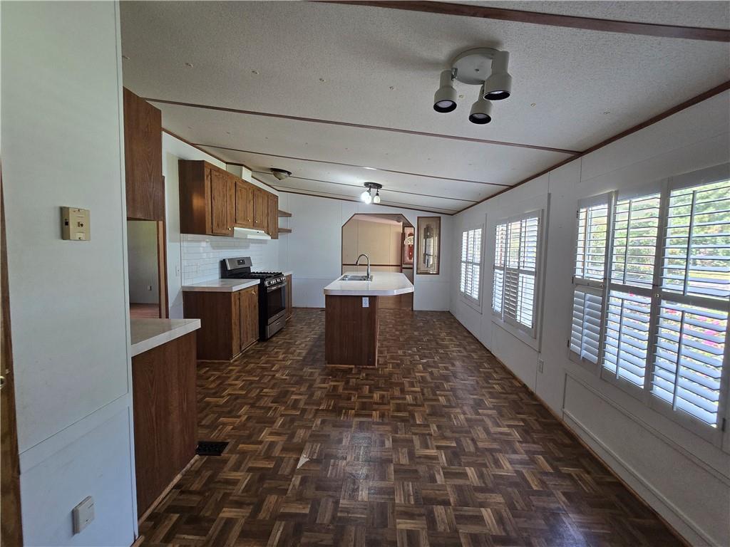 1120 Fincherville Road Jackson, GA 30233 - Photo 10 of 38 a large room with wooden floor