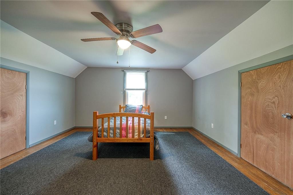 393 Freeport Road Butler, PA 16002 - Photo 15 of 43 an empty room with windows and fan