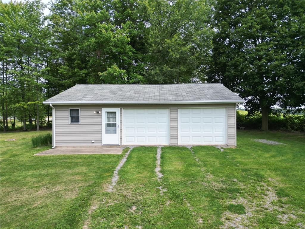 393 Freeport Road Butler, PA 16002 - Photo 28 of 43 a aerial view of a house with yard and tree in it