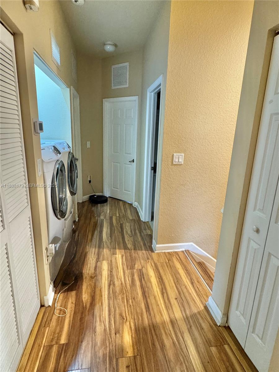 23477 Southwest 112th Place Homestead, FL 33032 - Photo 14 of 49 a view of utility room with washer and dryer