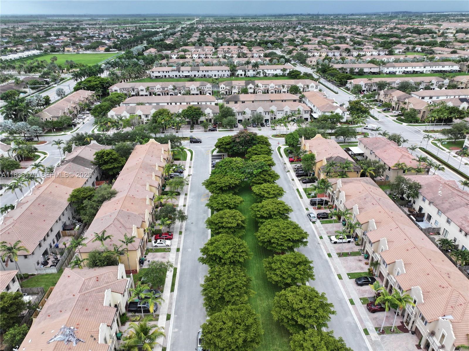 23477 Southwest 112th Place Homestead, FL 33032 - Photo 36 of 49 an aerial view of residential houses with outdoor space