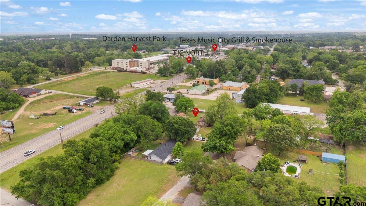 701 Georgia Street Lindale, TX 75771 - Photo 36 of 37 an aerial view of residential houses with outdoor space