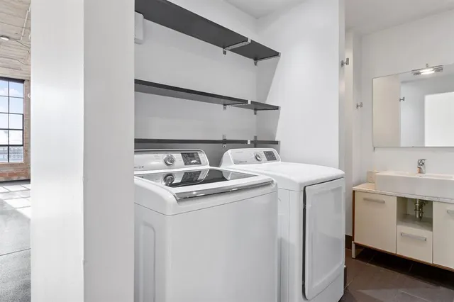 a utility room with dryer and washer