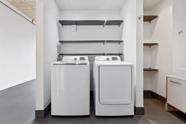 a utility room with dryer and washer