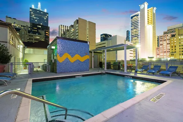an aerial view of a house with outdoor space