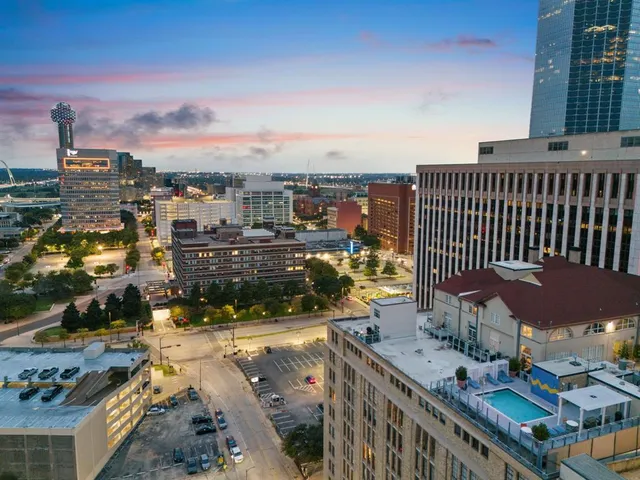 a city view with tall buildings