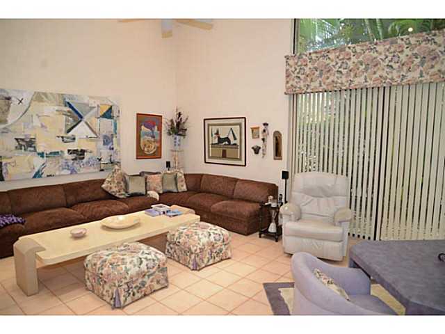 17064 Ryton Lane Boca Raton, FL 33496 - Photo 21 of 23 a bedroom with a bed and a couch