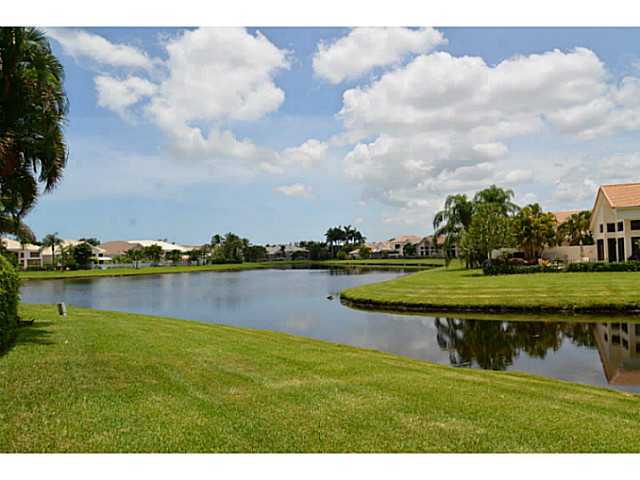 17064 Ryton Lane Boca Raton, FL 33496 - Photo 5 of 23 a view of a lake with houses in the back