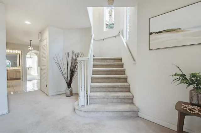 a bathroom with a tub and shower