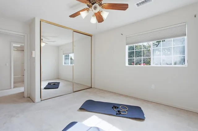 a front view of a house with yard