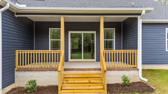 a house view with a garden space