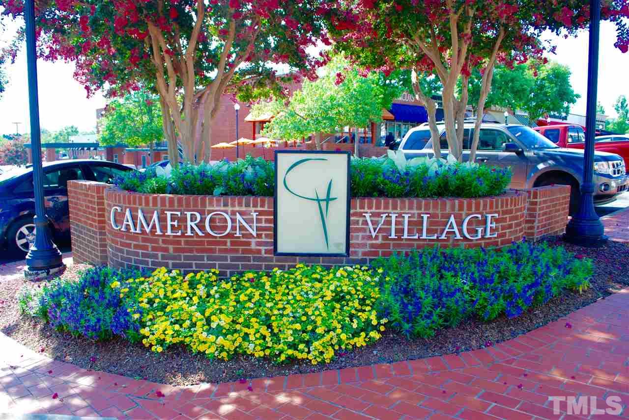 3404 Cherry Lane Raleigh, NC 27607 - Photo 18 of 19 a sign that is sitting in front of flowers