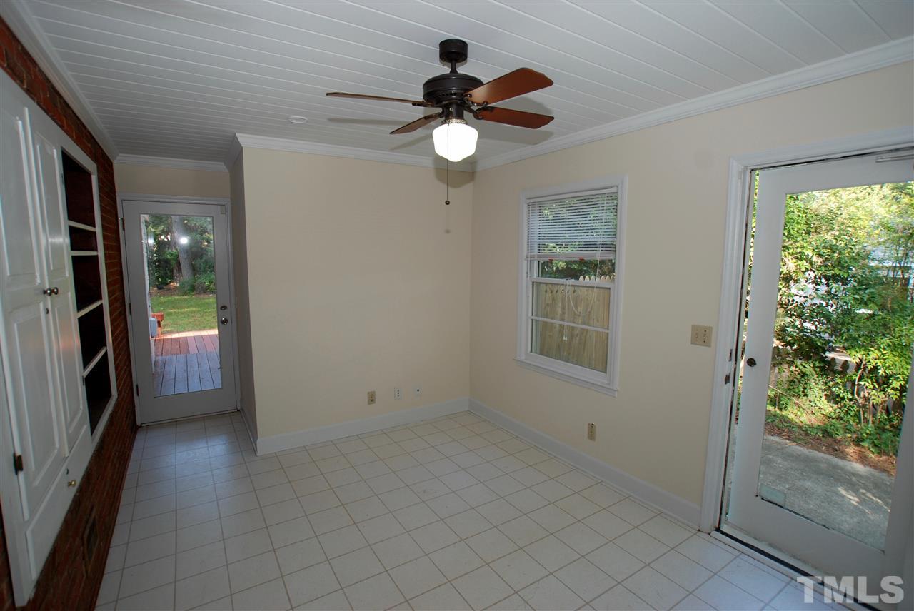 3404 Cherry Lane Raleigh, NC 27607 - Photo 10 of 19 a view of empty room with window and ceiling fan