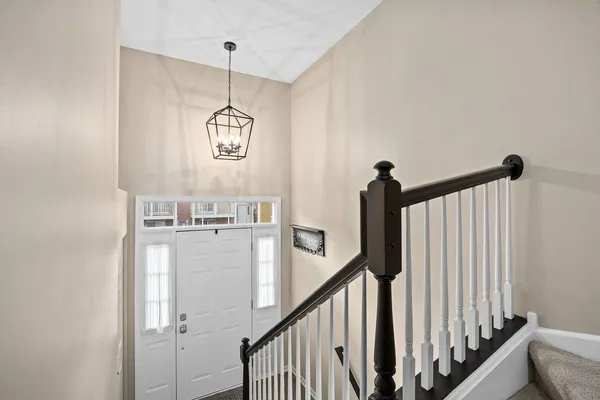 a view of a hallway with windows