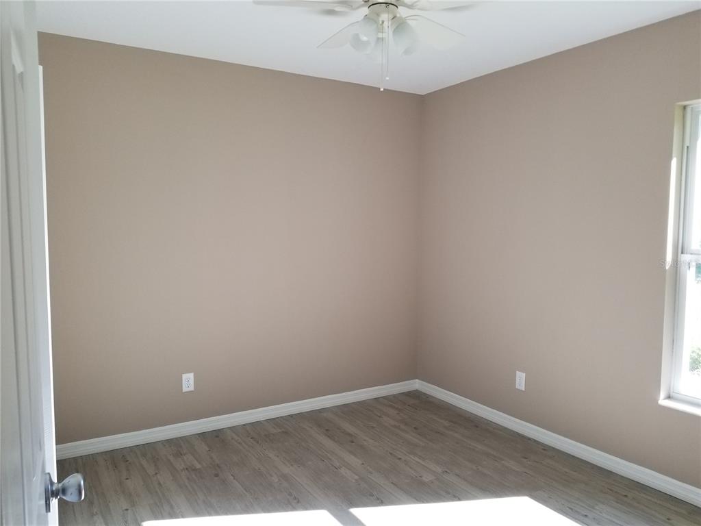 326 Clark Street Inverness, FL 34452 - Photo 19 of 19 an empty room with a window