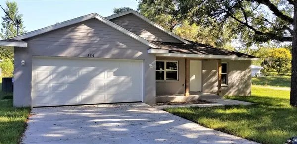 a view of outdoor space yard and garage