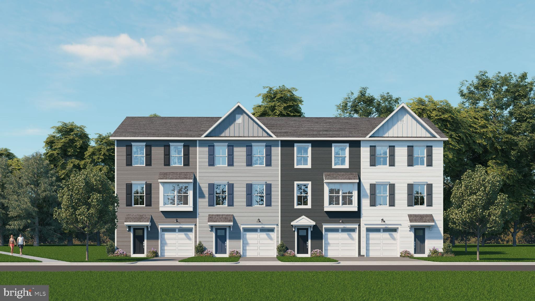 a view of a big house with a yard and plants