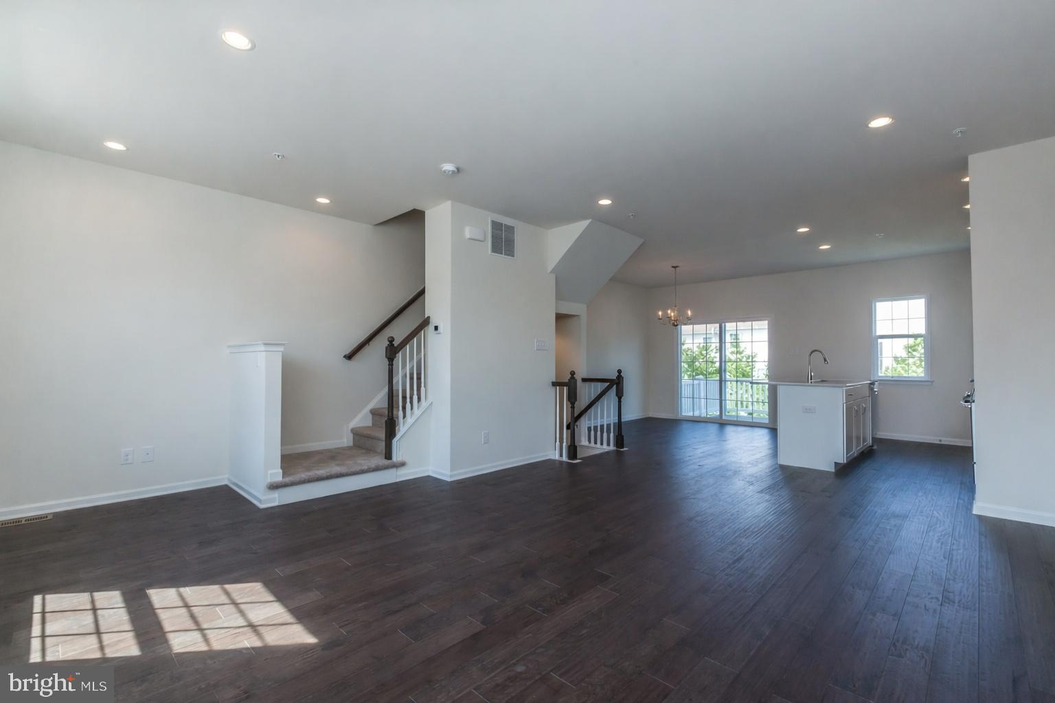 506 Park Road Spring City, PA 19475 - Photo 13 of 15 a view of empty room with wooden floor and fan