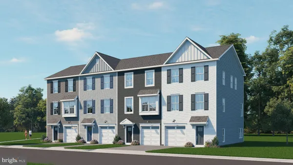 a view of a big house with a yard