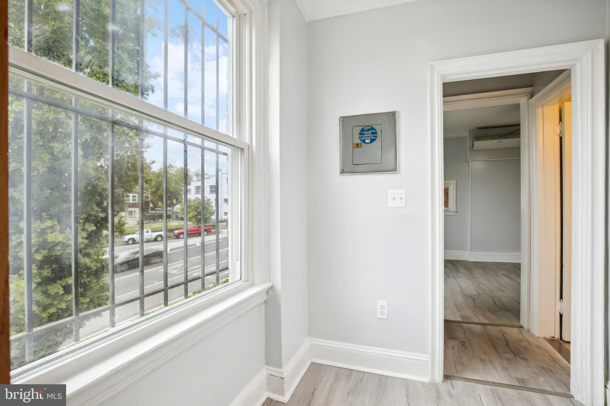 3701 13th Street Northwest, Unit 102 Washington, DC 20010 - Photo 14 of 38 a view of a glass door and a window