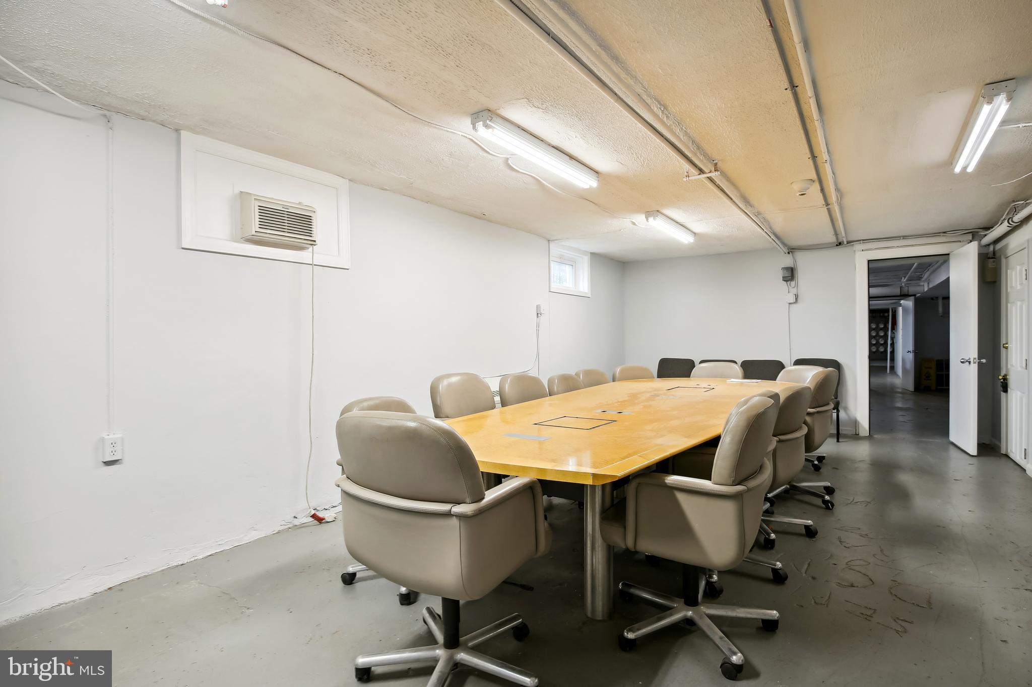 3701 13th Street Northwest, Unit 102 Washington, DC 20010 - Photo 21 of 38 a dining room with a table and chairs