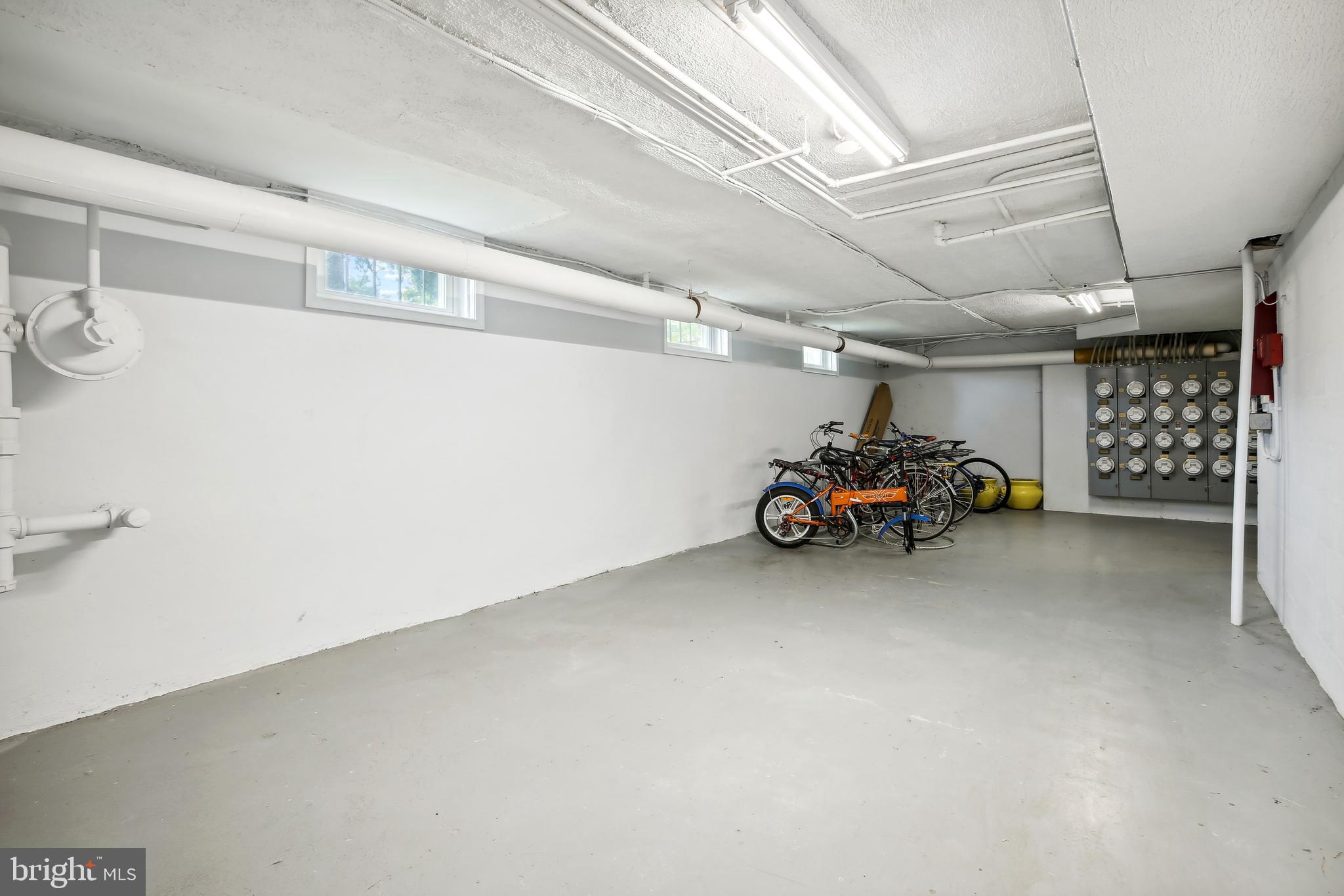 3701 13th Street Northwest, Unit 102 Washington, DC 20010 - Photo 23 of 38 a view of parking garage with cars