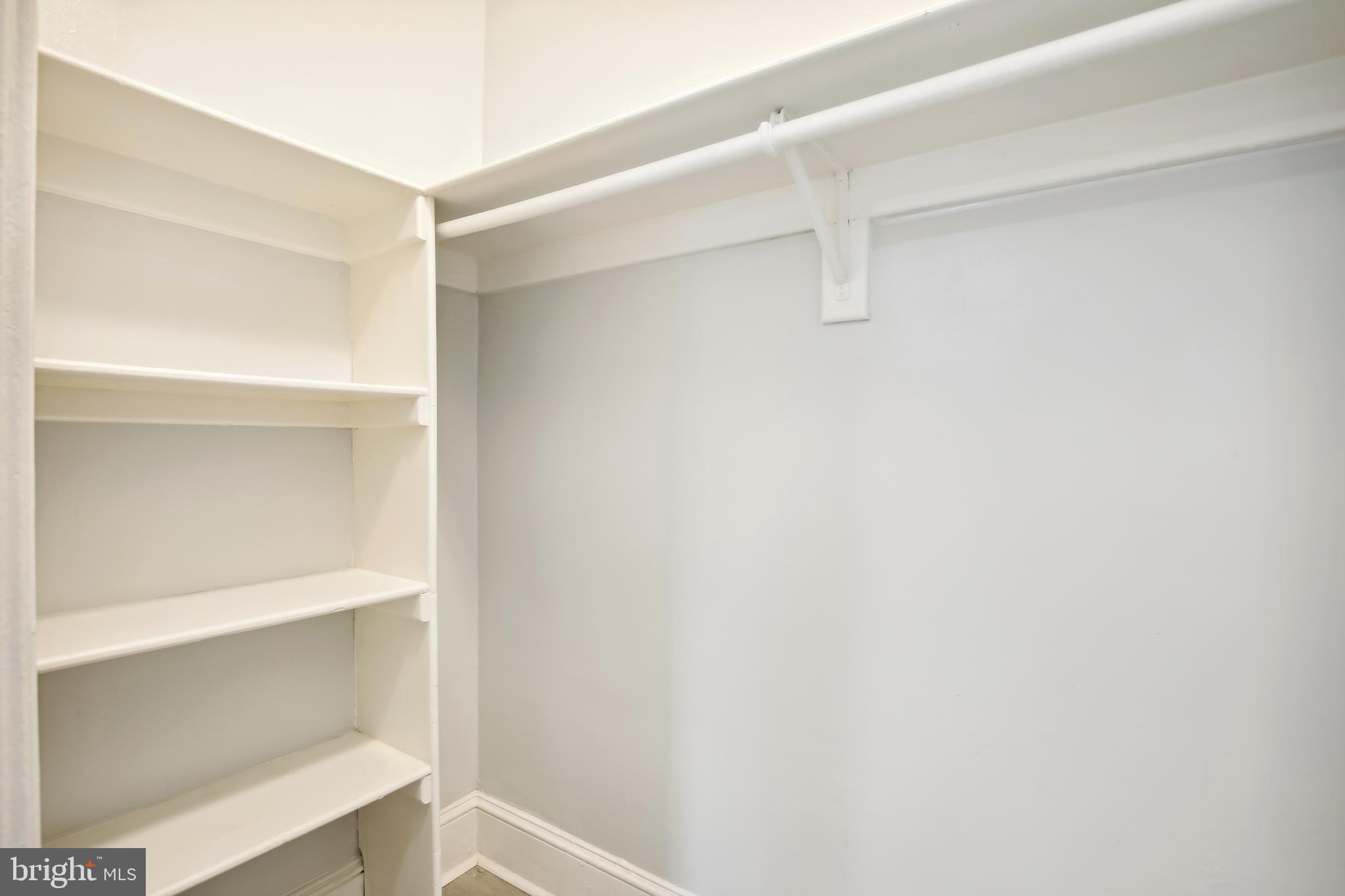 3701 13th Street Northwest, Unit 102 Washington, DC 20010 - Photo 6 of 38 a view of an empty walk in closet