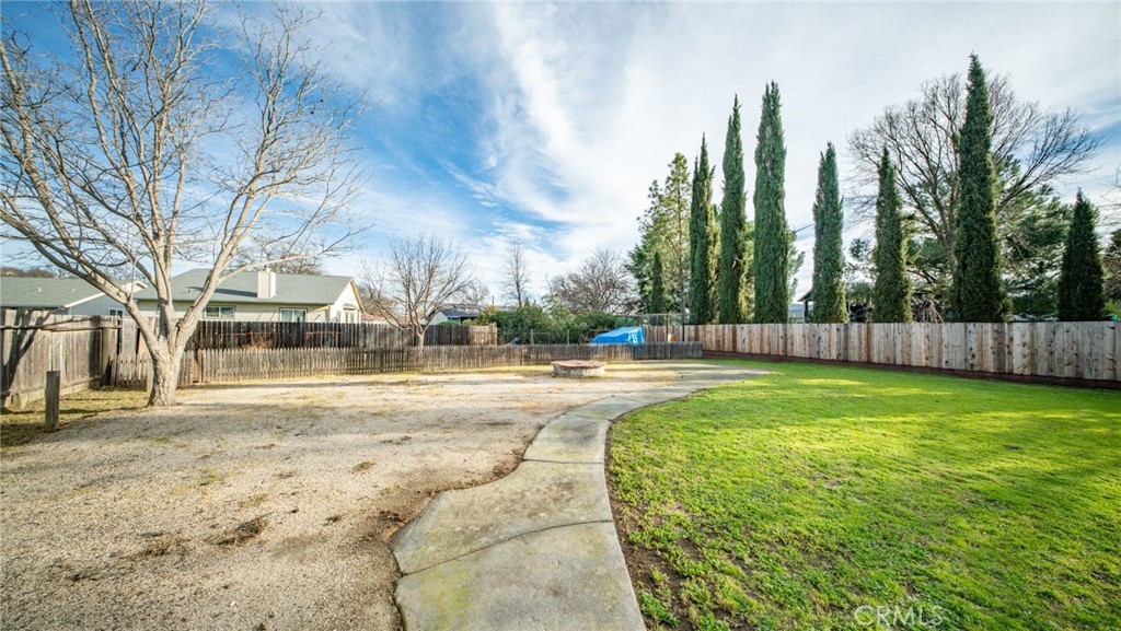18825 Horseshoe Road Hidden Valley Lake, CA 95467 - Photo 16 of 17 Backyard with gardening area in rear.