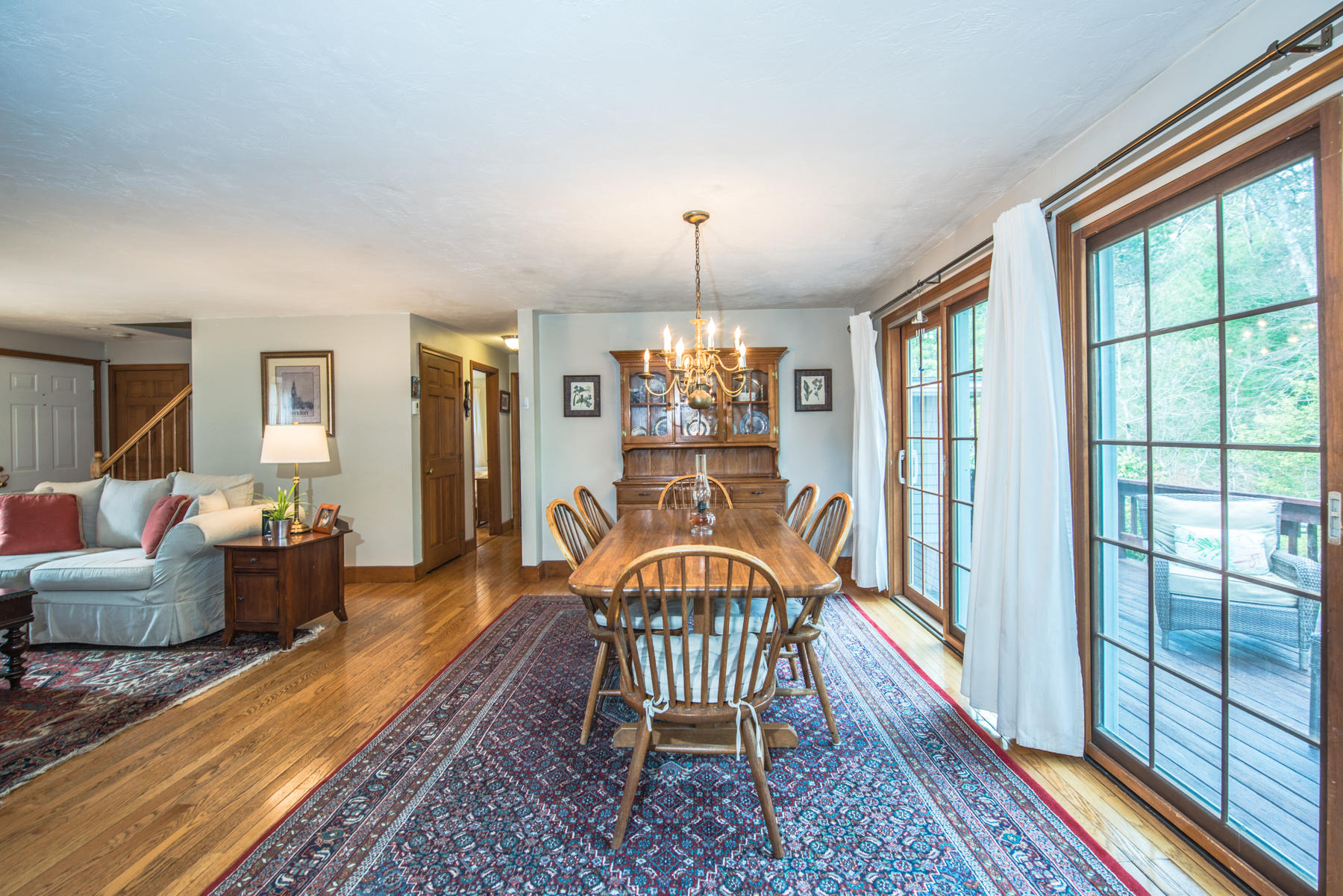 787 County Road Pocasset, MA 02559 - Photo 6 of 21 a living room with furniture and a chandelier