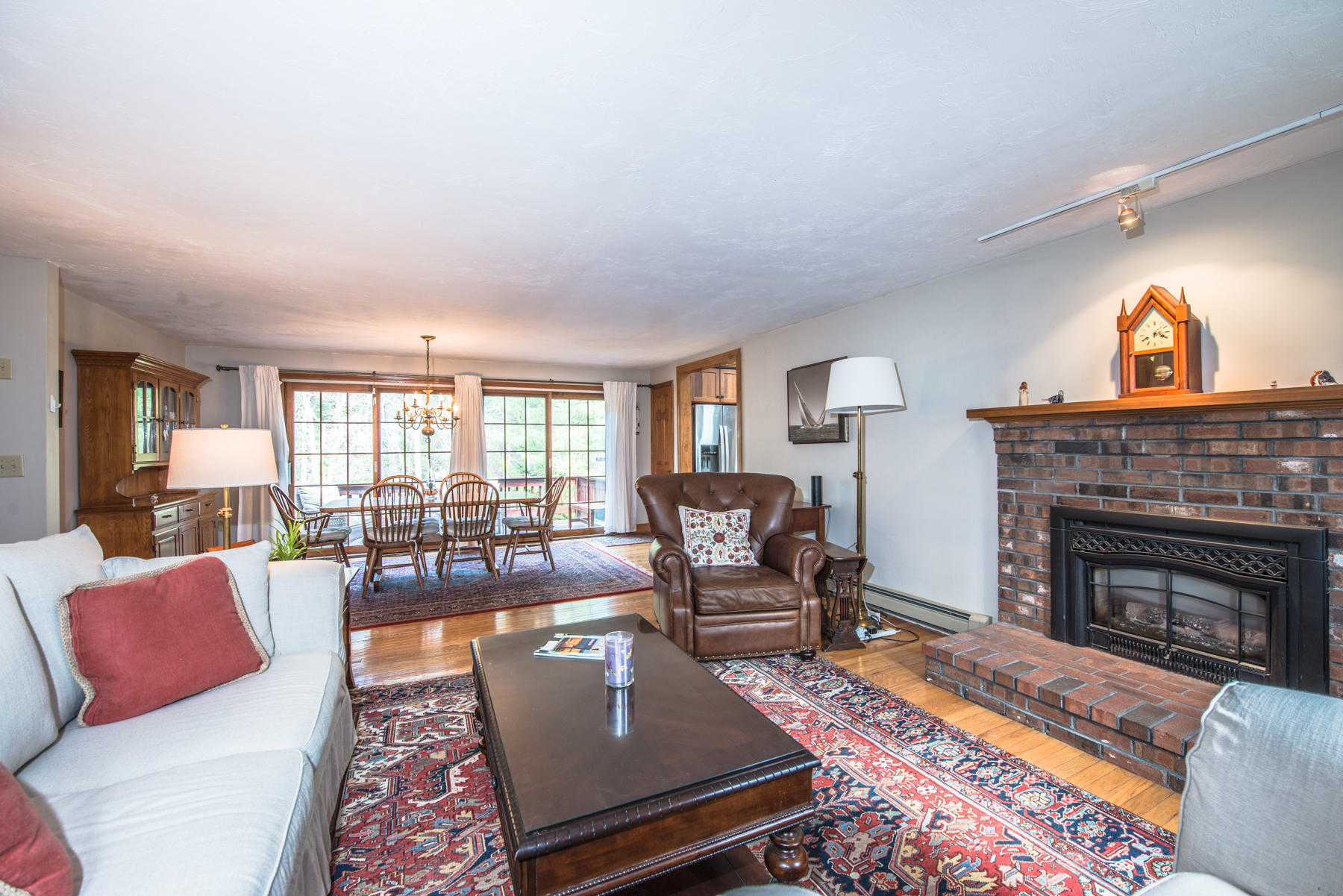 787 County Road Pocasset, MA 02559 - Photo 9 of 21 a living room with furniture and a fireplace