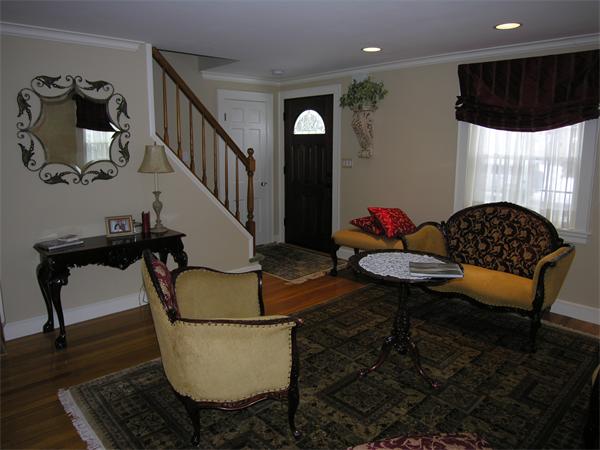 111 Hoover Road Needham, MA 02494 - Photo 4 of 28 a living room with furniture and a window