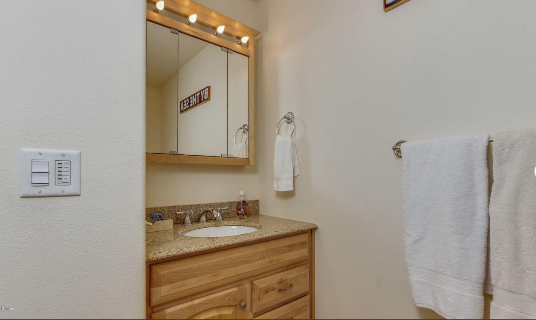 5777 Logan Road Lincoln City, OR 97367 - Photo 23 of 30 Guest Bathroom view 2