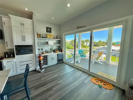 a room with bed and a view of bedroom