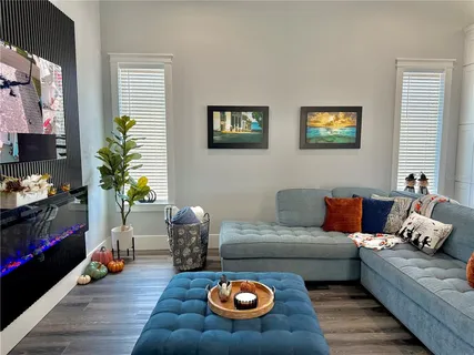 a bathroom with a double vanity sink and mirror