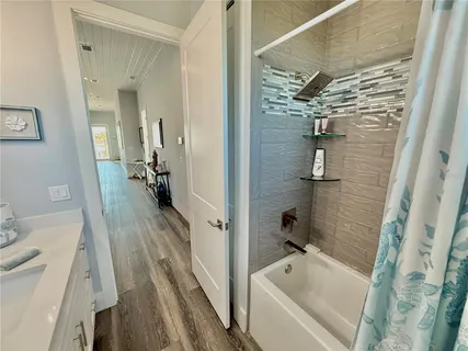 a view of a balcony with wooden floor