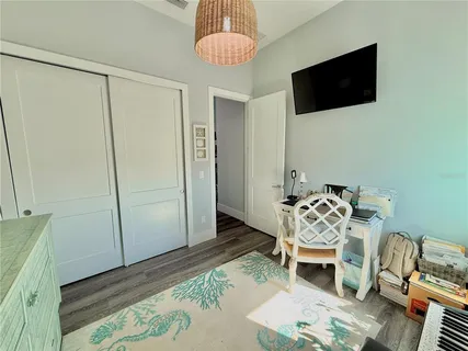 an aerial view of a house with swimming pool garden and outdoor seating