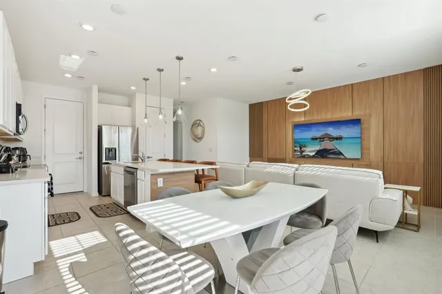 a view of a dining room with furniture
