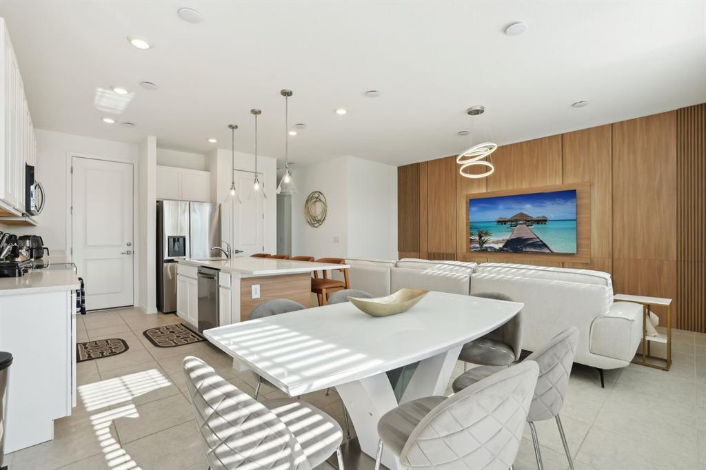 646 Longboat Drive Davenport, FL 33896 - Photo 26 of 41 a view of a dining room with furniture