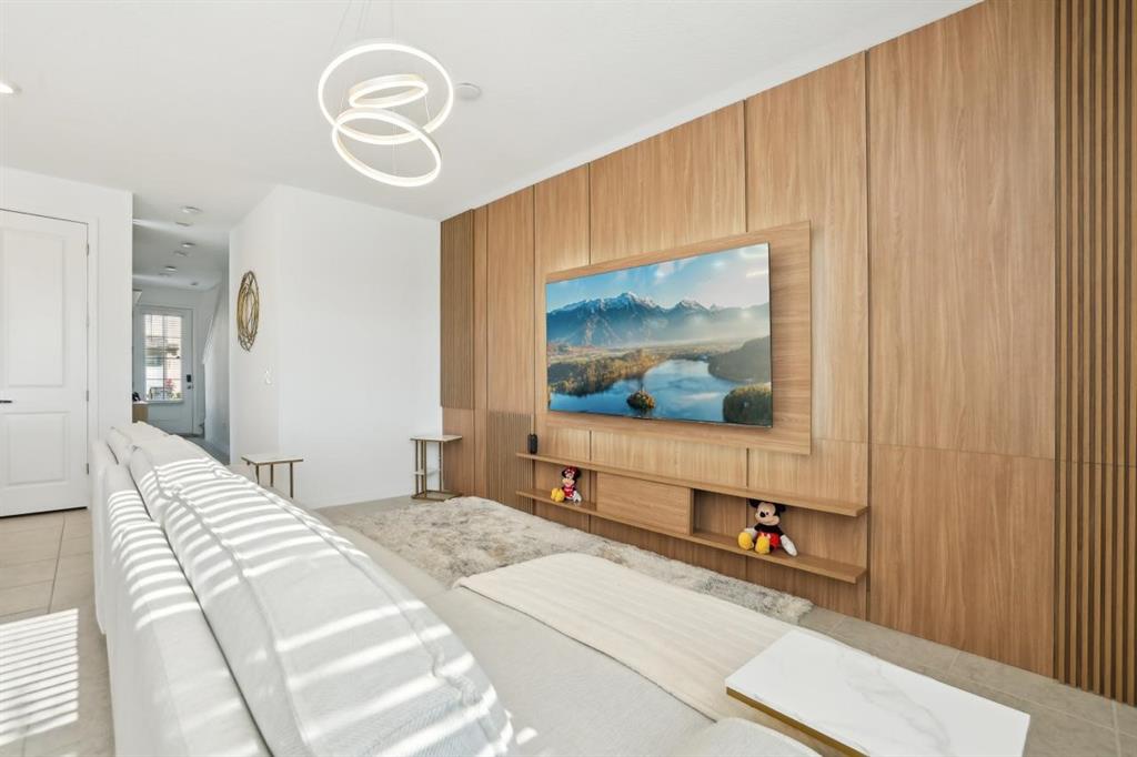 646 Longboat Drive Davenport, FL 33896 - Photo 30 of 41 a bedroom with a bed and a painting on the wall