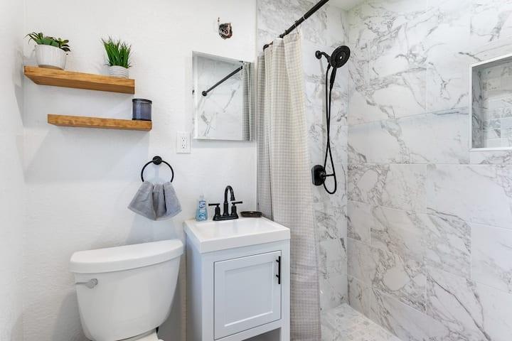 646 Longboat Drive Davenport, FL 33896 - Photo 9 of 41 a bathroom with a toilet sink and mirror