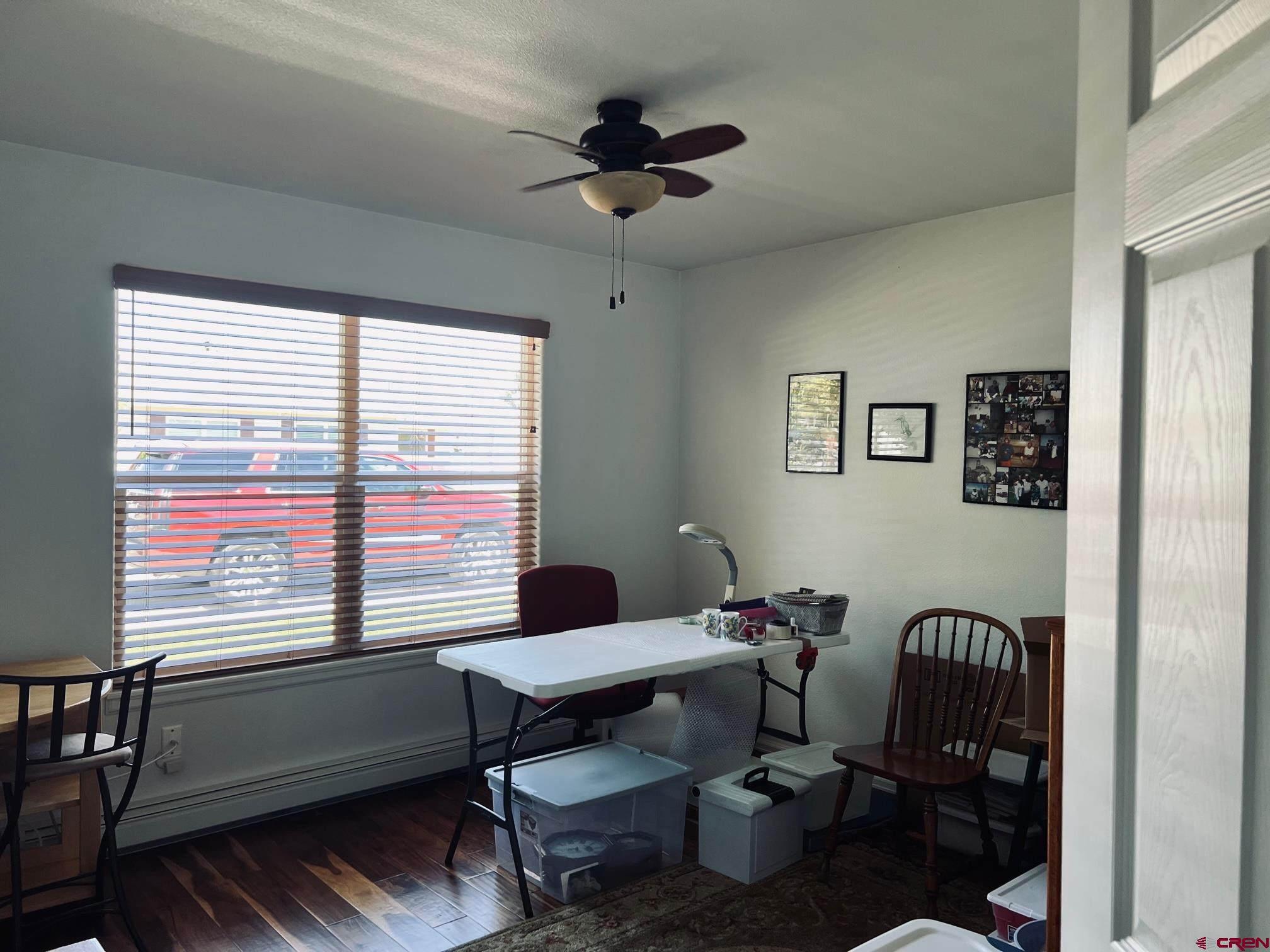 511 Hazel Circle Fruita, CO 81521 - Photo 17 of 24 a workspace with furniture and a window