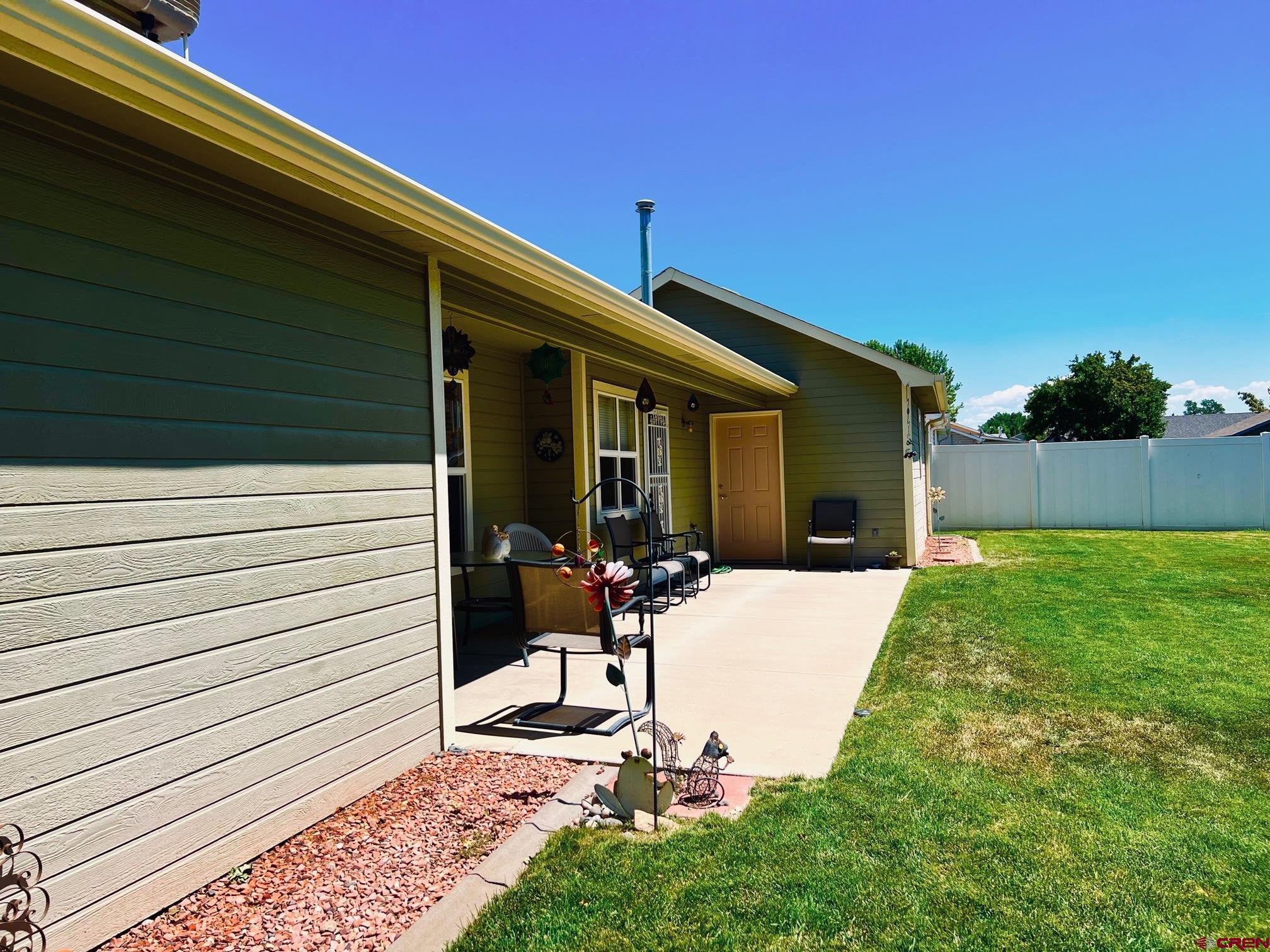 511 Hazel Circle Fruita, CO 81521 - Photo 4 of 24 a front view of a house with garden
