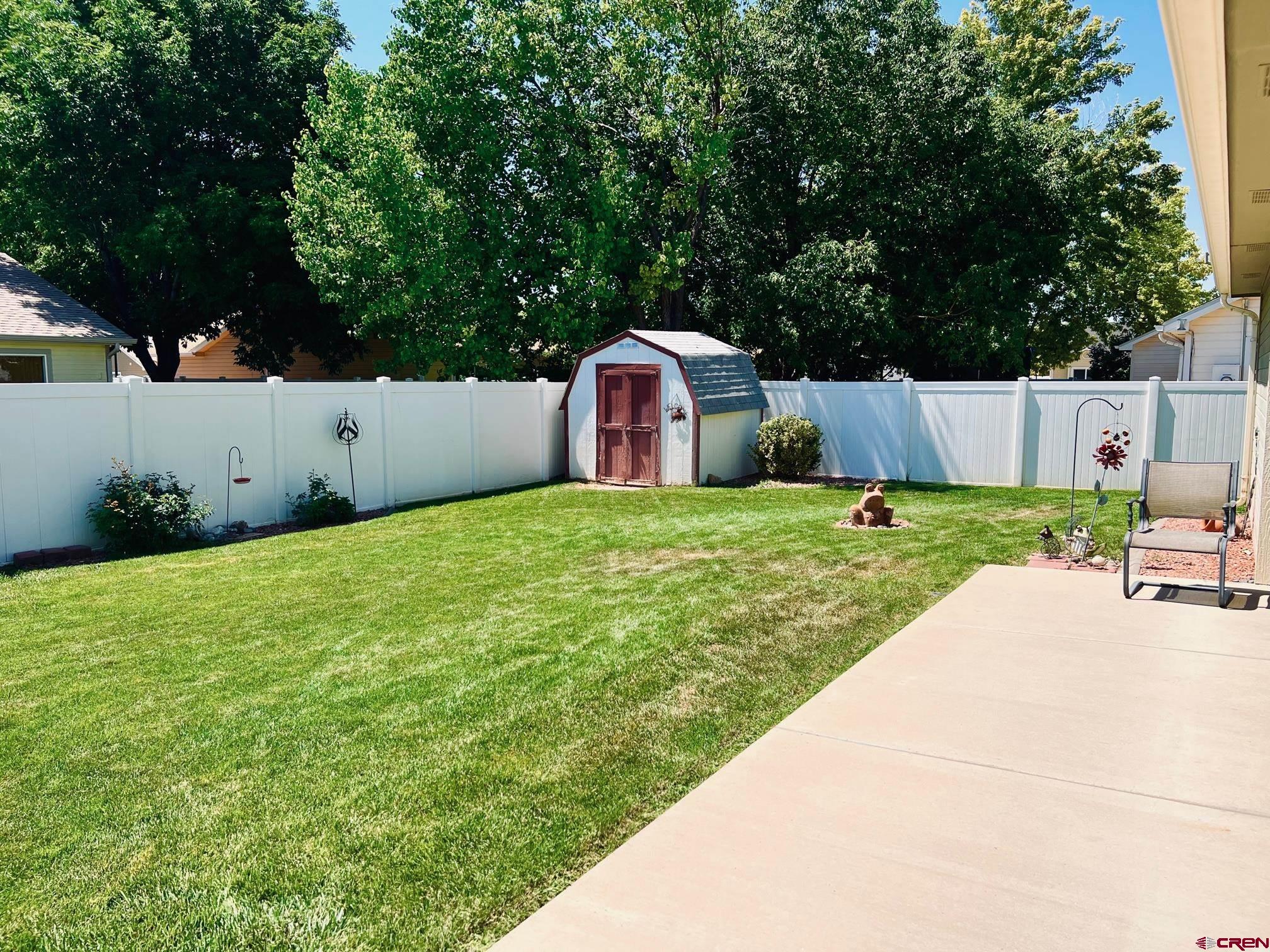 511 Hazel Circle Fruita, CO 81521 - Photo 8 of 24 a view of a backyard