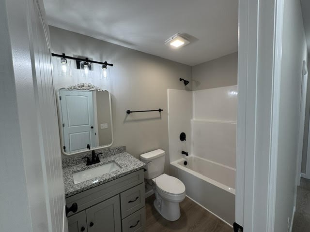 1267 Higginbotham Road McMinnville, TN 37110 - Photo 11 of 13 a bathroom with a granite countertop sink toilet and shower