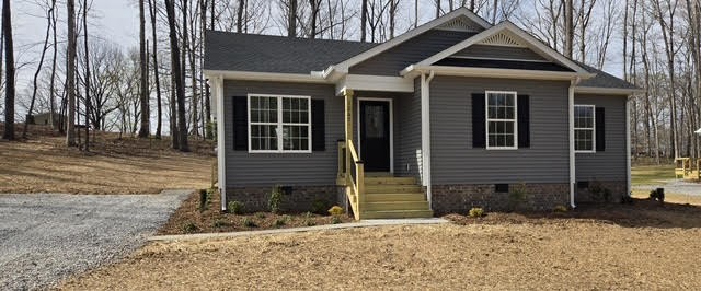 1267 Higginbotham Road McMinnville, TN 37110 - Photo 2 of 13 a front view of a house with a yard