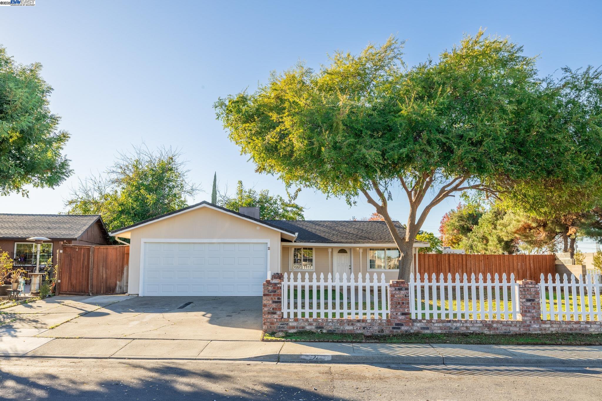 2 Salisbury Drive Pittsburg, CA 94565 - Photo 1 of 1 a front view of a house with a garden
