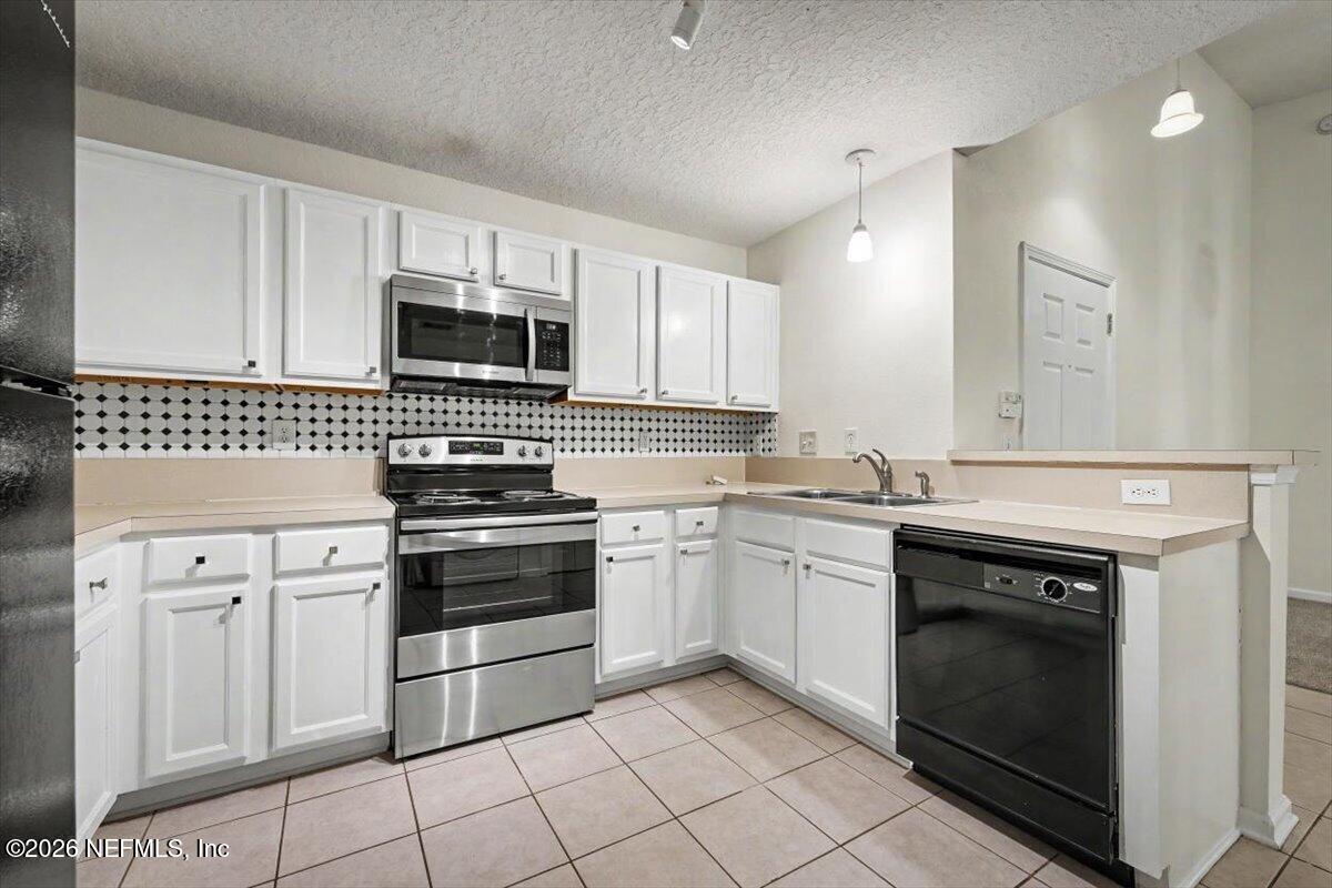 7920 Merrill Road, Unit 116 Jacksonville, FL 32277 - Photo 3 of 33 Kitchen